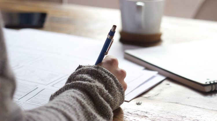 person tracking finances during divorce